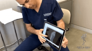 Dr. David Soomekh, DPM, shares patients' pedCAT scans with them via a tablet. He said the datasets wirelessly upload to the viewer in less than 10 minutes."